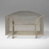 Shiro Kuramata, How High the Moon armchair, 1986, nickel-plated steel
