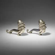 Rare Moaninlo bookends by Russel Wright, c. 1930, nickel-plated metal, sold Dec 2023