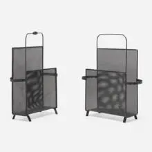 Magazine stands, pair by Mathieu Matégot, c. 1955, perforated and enameled steel, sold Dec 2023
