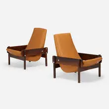 Sergio Rodrigues, Vronka chairs, pair, 1962, rosewood, vinyl, chrome-plated brass