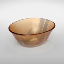 A Fasce Applicate bowl, model 3762 by Carlo Scarpa, c. 1940, fume glass with applied ribbon elements, sold Dec 2023