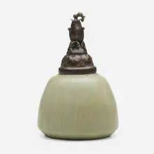 Lidded vessel by Patrick Nordström and Georg Thylstrup, c. 1930, glazed stoneware, patinated copper, sold Nov 2023