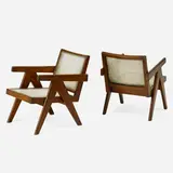 Pair of lounge chairs from the Chandigarh administrative buildings by Pierre Jeanneret, France/India, sold May 2018