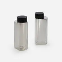 Cocktail shakers, pair by Folke Arström, c. 1930, silver-plated metal, Bakelite, sold Nov 2023