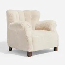 Wingback armchair, model 1518 by Fritz Hansen, c. 1950, faux sheepskin, walnut, sold Nov 2023
