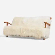 Sofa, model 1590a by Fritz Hansen, c. 1942, faux sheepskin, beech, sold Nov 2023