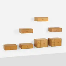 Wall-mounted cabinets, set of seven by Uno and Osten Kristiansson, c. 1960, teak, sold Nov 2023