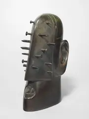 Nagelkopf by Rainer Kriester, Um 1980, Bronze mit schwarzgrüner Patina. Höhe: 21 cm (8 ¼ in.), sold Apr 2025
