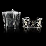Two bracelets (Figures by Ruth Roach, sold May 2018