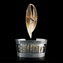 Double layer cuff and stylized seed pod pin by Ruth Roach, sold May 2018