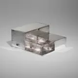 Tobacco box by Robert Mallet-Stevens, c. 1928, nickel-plated brass, sold Oct 2023