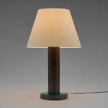 Table lamp by Paul Dupré-Lafon, c. 1955, stacked box leather, brass, paper shade, sold Oct 2023