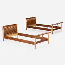 Twin-size bedframes, pair by Finn Juhl, c. 1951, walnut, maple, sold Oct 2023