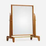 Vanity mirror by T. H. Robsjohn-Gibbings, c. 1955, mahogany, mirrored glass, brass, sold Oct 2023