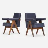 Committee chairs from High Court, Chandigarh, pair by Pierre Jeanneret, c. 1953, teak, leather, brass, sold Oct 2023