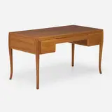 Rare desk by T. H. Robsjohn-Gibbings, c. 1961, walnut, sold Oct 2023