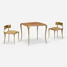 Aria game table and chairs, pair by Paul Mathieu, 2006, cast bronze, rosewood, leather, sold Oct 2023