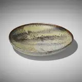 Plate by Toshiko Takaezu, glazed stoneware, sold Oct 2023