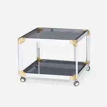 Occasional table by attribution Mastercraft, c. 1975, chrome-plated steel, brass, smoked glass, sold Oct 2023