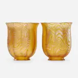 Two gold Favrile glass shades by Tiffany Studios, sold May 2018