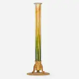 Massive Favrile vase on scrollwork base by Tiffany Studios, sold May 2018