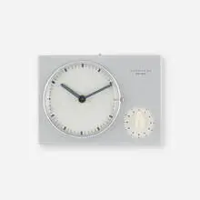 Wall clock and timer by Max Bill, c. 1954, glazed porcelain, chrome-plated brass, enameled aluminum, plastic, sold Oct 2023