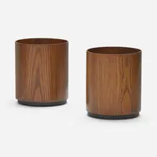 Wastepaper baskets from a Los Angeles interior by Oliver Furth, pair by Jens Risom, c. 1960, molded walnut plywood, plastic, sold Oct 2023