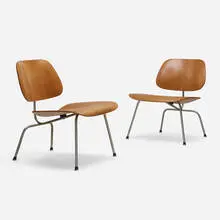 LCMs, pair by Charles and Ray Eames, walnut plywood, chrome-plated steel, rubber, sold Aug 2023