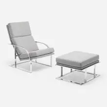 Lounge chair and ottoman by Modernist, c. 1970, chrome-plated steel, upholstery, sold Aug 2023