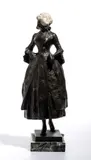 Bronze and ivory sculpture by Emil Meier, depicts a young maiden in an elegant pose, offered Feb 2026