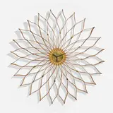 Sunflower wall clock, model 2261A by George Nelson & Associates, 1958-59, walnut and birch plywood, brass, enameled aluminum and steel, sold Aug 2023