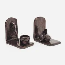 Bookends, pair by Beatrice Wood, c. 1980, luster-glazed earthenware, sold Aug 2023