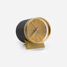 Electronic tabletop clock by Cyma Amic, brass, enameled aluminum, acrylic, sold Aug 2023