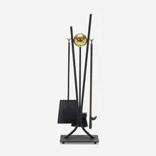 Fireplace tools by attribution Donald Deskey, c. 1955, enameled iron and steel, brass, bristle, sold Aug 2023