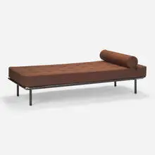 Daybed by Jean Prouvé, c. 1955, enameled steel, upholstery, sold Aug 2023