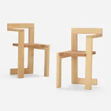 Chairs, pair by Gerrit Rietveld, c. 2000, pine, walnut, sold Aug 2023