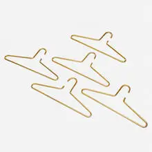 Coat Hangers, set of five by Carl Auböck, c. 1955, brass-plated steel, sold Aug 2023
