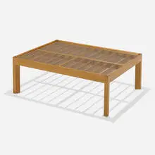 Coffee table by Paul Laszlo, c. 1950, mahogany, glass, sold Aug 2023