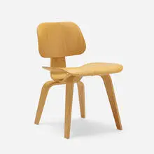 DCW by Charles and Ray Eames, ash plywood, rubber, sold Aug 2023