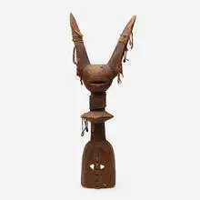 Shoulder mask by Mumuye artist, carved wood, rope, twine, shells, sold Aug 2023