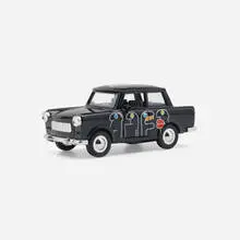 Trabant model car by Thierry Noir, c. 1995, enameled pot-metal, plastic, rubber, sold Aug 2023