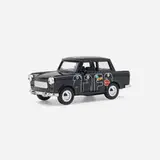 Trabant model car by Thierry Noir, c. 1995, enameled pot-metal, plastic, rubber, sold Aug 2023