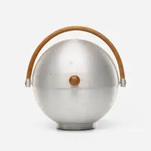 Bun warmer by Russel Wright, c. 1930, spun aluminum, wood, bamboo, birch, sold Aug 2023