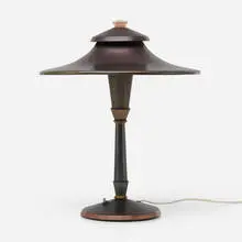 Table lamp by Modern, c. 1960, patinated copper, glass, sold Aug 2023