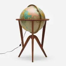 Cosmopolitan globe by Edward Wormley, 1953, walnut, brass, printed paper over plastic, sold Aug 2023