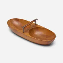 Nut bowl by Carl Auböck, c. 1950, mahogany, brass, leather, sold Aug 2023