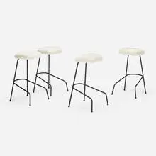 Stools, set of four by California Modern, c. 1950, enameled steel, sheepskin, rubber, sold Aug 2023