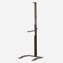 Easel by Modern, c. 1980, patinated steel, stitched leather, sold Aug 2023