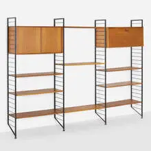 Ladderax wall shelving system by Robert Heal, 1964, teak, enameled steel, brass, sold Aug 2023