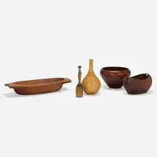 Tabletop accessories by Modern, c. 1960, carved and turned wood, sold Aug 2023